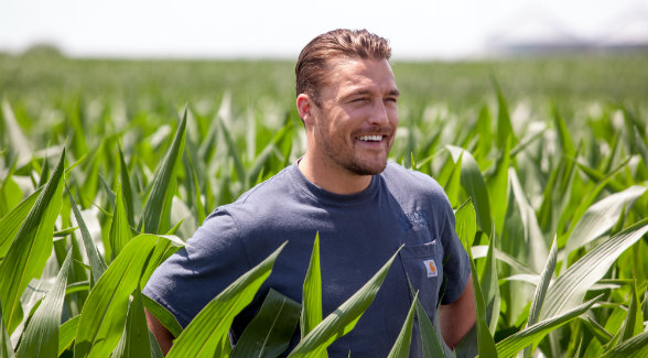 The third-generation farmer is happiest in the field.